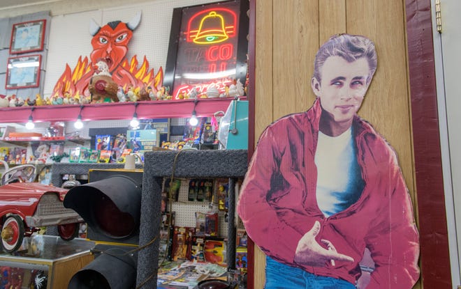 A cardboard cutout of actor James Dean leans against a wall at the A-Z Jewelry & Swap Shop in downtown Peoria.