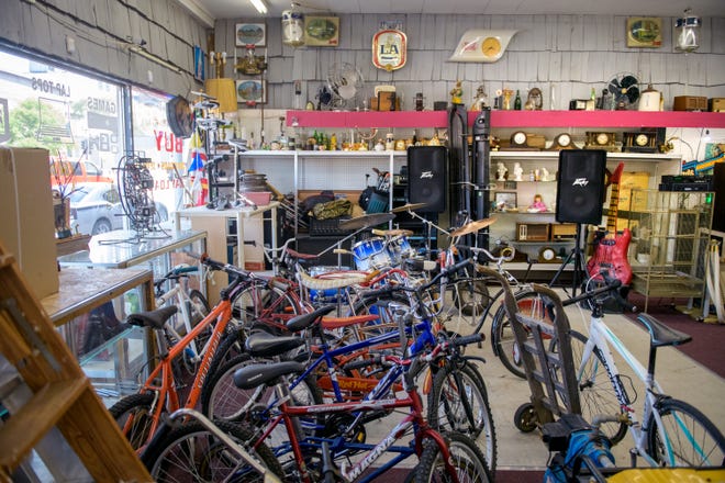 A hodge-podge of bicycles, mantel clocks, musical instruments, knick-knacks and many other used and vintage items can be found at A-Z Jewelry & Swap in downtown Peoria.