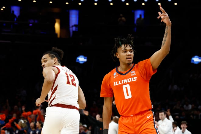 Mar 28, 2024; Boston, MA, USA; Illinois Fighting Illini guard Terrence Shannon Jr. (0) reacts after making a basket against the Iowa State Cyclones in the semifinals of the East Regional of the 2024 NCAA Tournament at TD Garden. Mandatory Credit: Winslow Townson-USA TODAY Sports