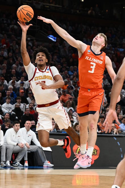 Mar 28, 2024; Boston, MA, USA; Iowa State Cyclones guard Curtis Jones (5) shoots the ball against Illinois Fighting Illini forward Marcus Domask (3) in the semifinals of the East Regional of the 2024 NCAA Tournament at TD Garden. Mandatory Credit: Brian Fluharty-USA TODAY Sports