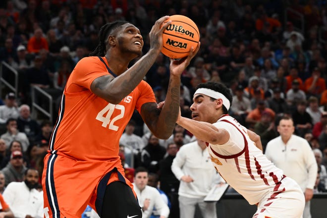 Mar 28, 2024; Boston, MA, USA; Illinois Fighting Illini forward Dain Dainja (42) shoots the ball against Iowa State Cyclones guard Tamin Lipsey (3) in the semifinals of the East Regional of the 2024 NCAA Tournament at TD Garden. Mandatory Credit: Brian Fluharty-USA TODAY Sports