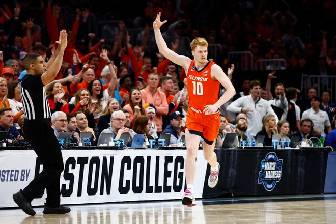 Illinois Fighting Illini guard Luke Goode (10) reacts after a basket against the Iowa State Cyclones in the semifinals of the East Regional of the 2024 NCAA Tournament at TD Garden in Boston on March 28, 2024.
