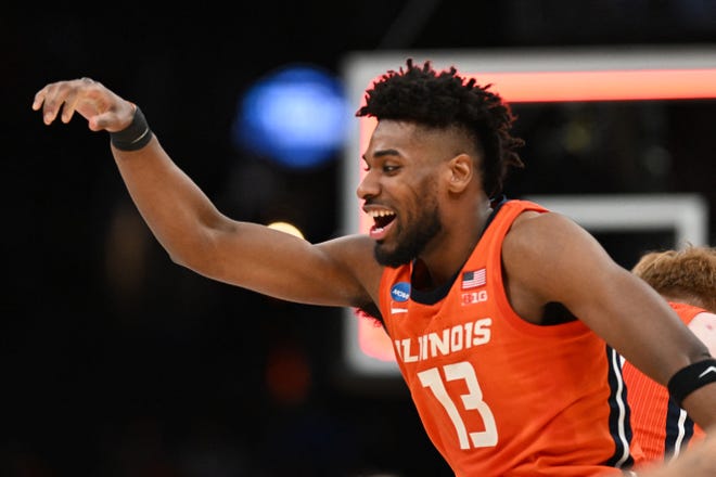 Mar 28, 2024; Boston, MA, USA; Illinois Fighting Illini forward Quincy Guerrier (13) reacts against the Iowa State Cyclones in the semifinals of the East Regional of the 2024 NCAA Tournament at TD Garden. Mandatory Credit: Brian Fluharty-USA TODAY Sports