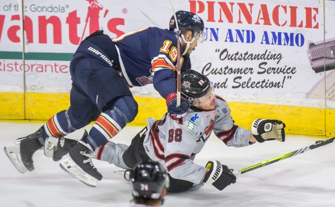 Peoria's Zach Wilkie, top, rides Huntsville's Phil Elgstam to the ice in the first period of Game 2 of the SPHL President's Cup finals Saturday, April 27, 2024 at the Peoria Civic Center. The Rivermen forced a Game 3 with a 6-4 victory.