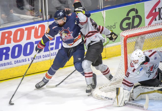 Peoria's Mitch McPherson, left, tangles with Huntsville's Jeremy Gervais in the second period of Game 2 of the SPHL President's Cup finals Saturday, April 27, 2024 at the Peoria Civic Center. The Rivermen forced a Game 3 with a 6-4 victory.