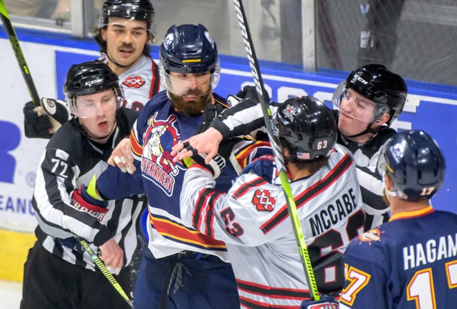 Peoria's Mitch McPherson tangles with Huntsville's Craig McCabe in the first period of Game 2 of the SPHL President's Cup finals Saturday, April 27, 2024 at the Peoria Civic Center. The Rivermen forced a Game 3 with a 6-4 victory.