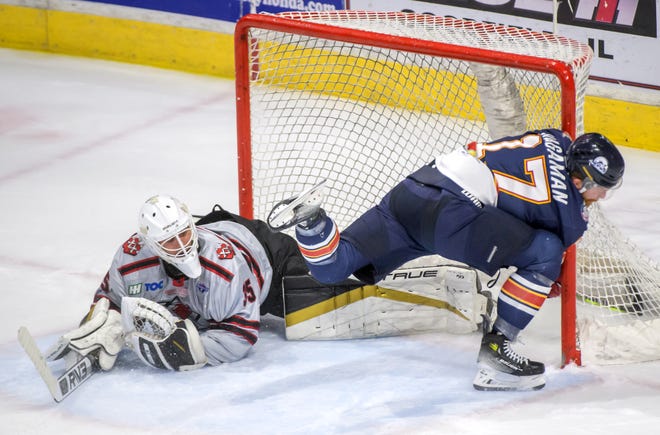 Peoria's Alec Hagaman slams into the post after scoring on Huntsville goaltender Mike Robinson in the first period of Game 2 of the SPHL President's Cup finals Saturday, April 27, 2024 at the Peoria Civic Center. The Rivermen forced a Game 3 with a 6-4 victory.