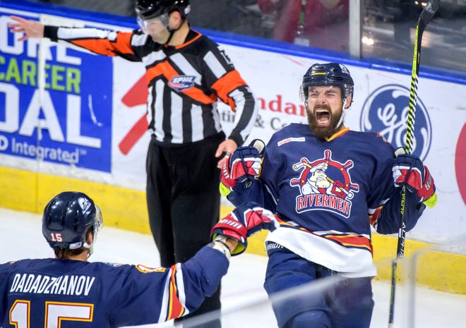 Peoria's Mitch McPherson, right, celebrates after his goal against the Huntsville Havoc in the first period of the deciding game of the SPHL President's Cup finals Sunday, April 28, 2024 at the Peoria Civic Center.