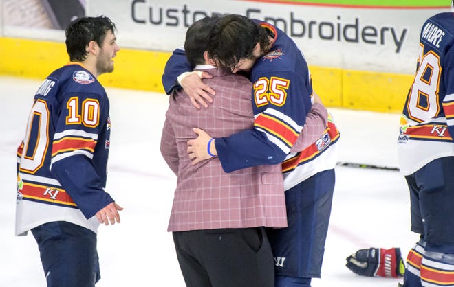 Peoria Rivermen head coach Jean-Guy Trudel hugs his son Tristan Trudel after the team defeated the Huntsville Havoc in the deciding game of the SPHL President's Cup finals Sunday, April 28, 2024 at the Peoria Civic Center.