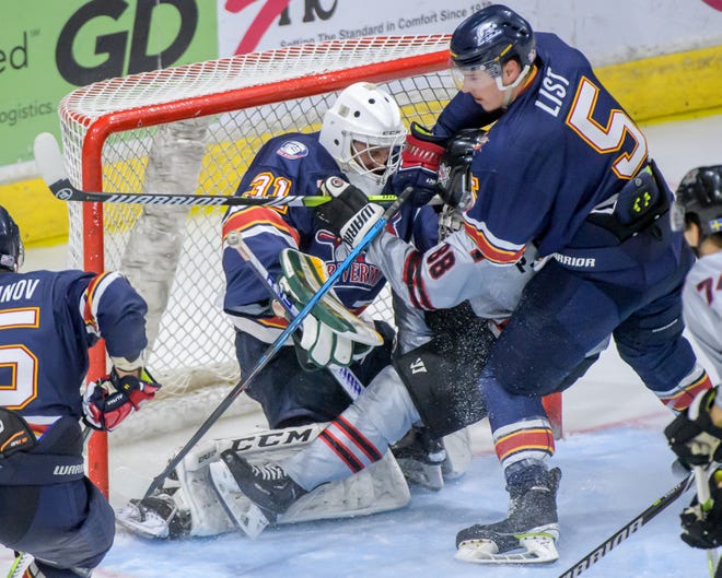 Huntsville's Phil Elgstam (88) collides with Peoria goaltender Nick Latinovich and Cale List in the third period of the deciding game of the SPHL President's Cup finals Sunday, April 28, 2024 at the Peoria Civic Center.