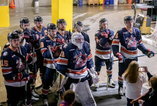 The Peoria Rivermen gather at the Zamboni entrance for player introductions before facing the Huntsville Havoc in the deciding game of the SPHL President's Cup finals Sunday, April 28, 2024 at the Peoria Civic Center.