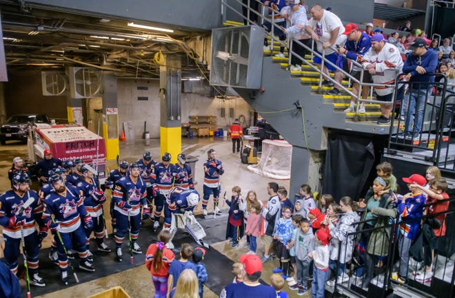 Fans gather on the steps leading down to the Zamboni entrance to welcome the Peoria Rivermen for player introductions before the start of the deciding game of the SPHL President's Cup finals Sunday, April 28, 2024 at the Peoria Civic Center. The Rivermen defeated the Huntsville Havoc 5-1 for the title.