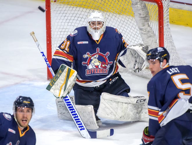Peoria goaltender Nick Latinovich keeps his eye on a flying puck as the Rivermen battle the Huntsville Havoc in the second period of the deciding game of the SPHL President's Cup finals Sunday, April 28, 2024 at the Peoria Civic Center.
