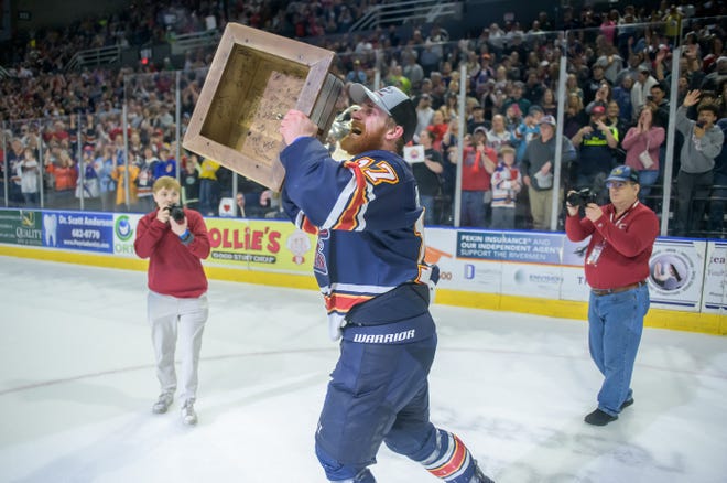 Peoria's Alec Hagaman raises the President's Cup after the Rivermen defeated the Huntsville Havoc 5-1 in the deciding game of the SPHL President's Cup finals Sunday, April 28, 2024 at the Peoria Civic Center.