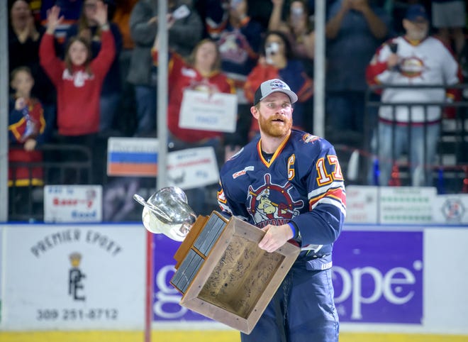 Peoria's Alec Hagaman holds the President's Cup on the ice after the Rivermen defeated the Huntsville Havoc 5-1 in the deciding game of the SPHL President's Cup finals Sunday, April 28, 2024 at the Peoria Civic Center.