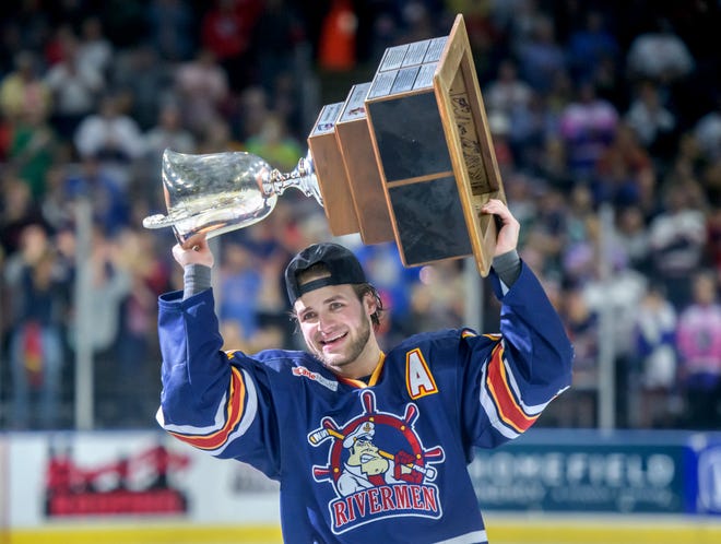 Peoria's Alec Baer hoists the President's Cup after the Rivermen defeated the Huntsville Havoc 5-1 in the deciding game of the SPHL President's Cup finals Sunday, April 28, 2024 at the Peoria Civic Center.