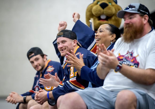 Peoria Rivermen captain Alec Hagaman smiles as the accolades flow for him during a public celebration of the team's SPHL President's Cup hockey championship Friday, May 3, 2024 at the Peoria Civic Center.